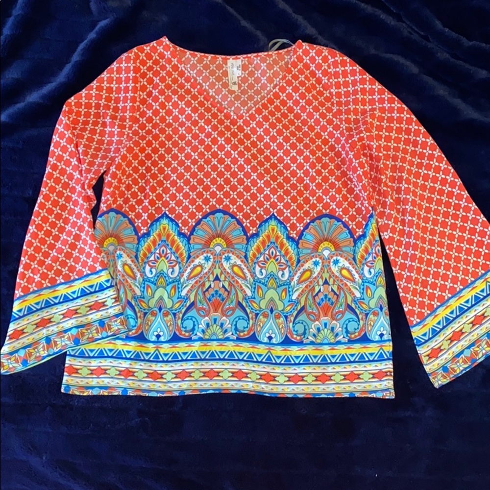 PINK OWL APPAREL.  BOLD COLORS. VNECK.BELL SLEEVES